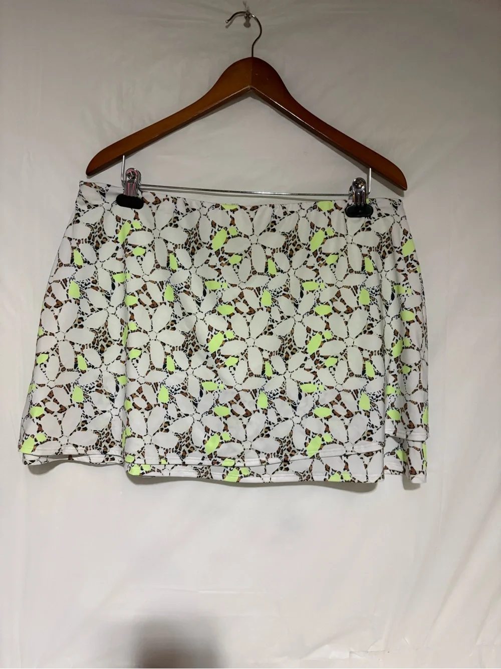 Cross court Floral Cutout Tennis Skort in White with Neon Yellow Accents
